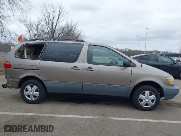 1999 Toyota Sienna LE with VIN 4T3ZF13C5XU121145, listed as a IAAI auction lot 41721171 with 229,760 mi miles and . Bid and sale history available at DreamBid. Image 13.