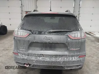 2021 Jeep Cherokee Trailhawk z VIN 1C4PJMBX4MD148597, wystawiony jako IAAI lot #41622099 z przebiegiem 48 452 mil mil oraz . Historia ofert i sprzedaży dostępna na DreamBid. Obrazek 16.