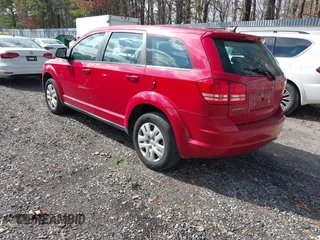 2013 Dodge Journey SE with VIN 3C4PDCABXDT721228, listed as a IAAI auction lot 41662172 with 311,815 mi miles. Bid and sale history available at carsss.com. Image 3.
