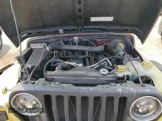 2003 Jeep Wrangler Sahara with VIN 1J4FA59S03P313418, listed as a Copart auction lot 64883094 with 184,658 mi miles and Salvage title. Bid and sale history available at DreamBid. Image 11.