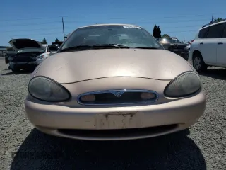 1996 Mercury Sable LS z VIN 1MELM53S8TA610706, wystawiony jako Copart lot #59506535 z przebiegiem 64 513 mil mil oraz Tytuł czysty. Historia ofert i sprzedaży dostępna na DreamBid. Obrazek 5.