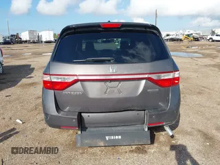 2011 Honda Odyssey Touring with VIN 5FNRL5H93BB104436, listed as a IAAI auction lot 40426003 with 93,342 mi miles and . Bid and sale history available at DreamBid. Image 16.
