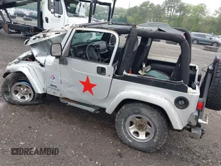 2003 Jeep Wrangler X with VIN 1J4FA39S13P363135, listed as a IAAI auction lot 42275729 with 178,138 mi miles and . Bid and sale history available at DreamBid. Image 3.