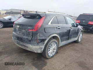 2024 Cadillac XT4 AWD Luxury with VIN 1GYFZBR41RF101697, listed as a IAAI auction lot 41971217 with 16,027 mi miles and . Bid and sale history available at carsss.com. Image 4.