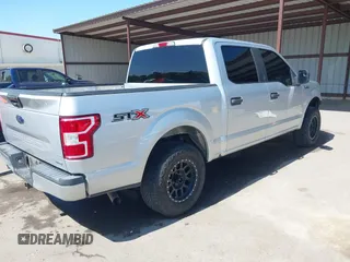 2018 Ford F-150 XL with VIN 1FTEW1CP6JKF36573, listed as a IAAI auction lot 42314415 with 121,240 mi miles and . Bid and sale history available at DreamBid. Image 4.