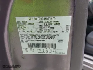 2005 Ford Escape XLT with VIN 1FMYU03175KD53760, listed as a IAAI auction lot 42124876 with 158,706 mi miles. Bid and sale history available at carsss.com. Image 9.