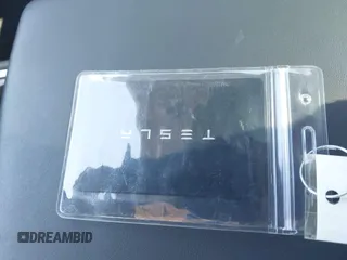 2023 Tesla Model 3 Long Range with VIN 5YJ3E1EB6PF634116, listed as a IAAI auction lot 41814670 with 47,801 mi miles and . Bid and sale history available at DreamBid. Image 11.