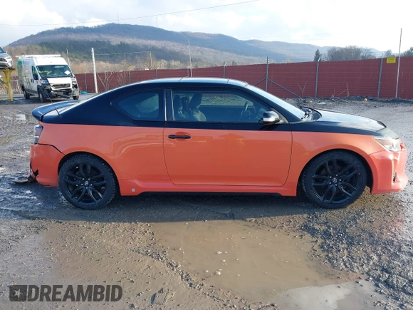 2015 Scion tC with VIN JTKJF5C77FJ008276, listed as a IAAI auction lot 41679236 with 90,987 mi miles. Bid and sale history available at carsss.com. Image 13.