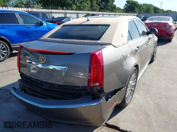 2012 Cadillac CTS Luxury z VIN 1G6DF5E58C0142041, wystawiony jako IAAI lot #42235864 z przebiegiem 59 697 mil mil oraz . Historia ofert i sprzedaży dostępna na DreamBid. Obrazek 4.