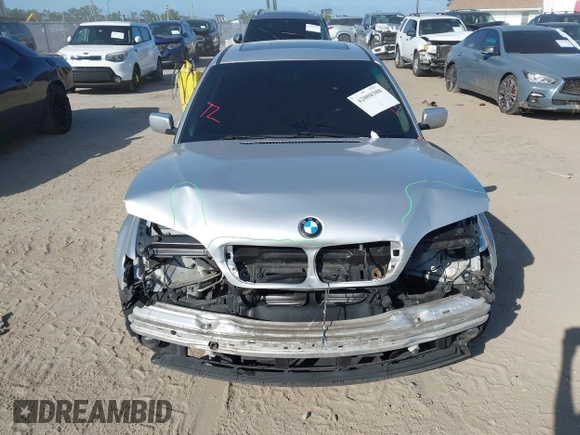 2002 BMW 3 Series 325i with VIN WBAEV33412KL55500, listed as a IAAI auction lot 42008308 with 172,852 mi miles. Bid and sale history available at carsss.com. Image 6.