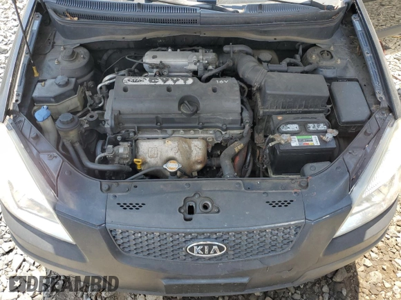 2009 Kia Rio LX with VIN KNADE223296539006, listed as a Copart auction lot 69229394 with 227,766 mi miles and Salvage Title. Bid and sale history available at DreamBid. Image 11.