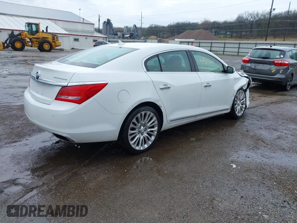 2014 Buick LaCrosse Premium II with VIN 1G4GF5G39EF305460, listed as a IAAI auction lot 41951229 with 127,188 mi miles and . Bid and sale history available at DreamBid. Image 4.
