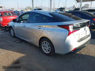 2019 Toyota Prius L Eco with VIN JTDKARFU2K3082593, listed as a IAAI auction lot 41657698 with 239,412 mi miles. Bid and sale history available at carsss.com. Image 3.