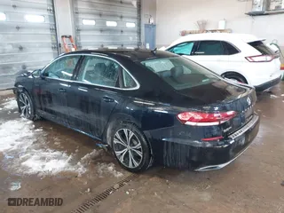 2022 Volkswagen Passat 2.0T SE with VIN 1VWSA7A31NC003418, listed as a IAAI auction lot 41608219 with 76,591 mi miles. Bid and sale history available at carsss.com. Image 3.