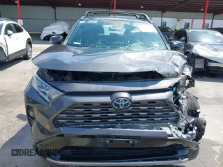 2021 Toyota RAV4 Hybrid XSE with VIN 2T3E6RFV8MW026973, listed as a IAAI auction lot 42052289 with 94,857 mi miles and . Bid and sale history available at DreamBid. Image 17.