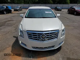 2014 Cadillac XTS Luxury z VIN 2G61M5S38E9215641, wystawiony jako Copart lot #53188695 z przebiegiem 97 431 mil mil oraz Szkody całkowita. Historia ofert i sprzedaży dostępna na DreamBid. Obrazek 5.