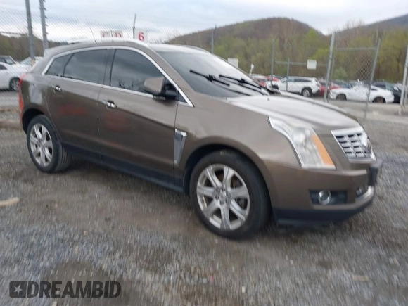 2014 Cadillac SRX Performance Collection with VIN 3GYFNCE33ES570472, listed as a IAAI auction lot 41971511 with 200,811 mi miles. Bid and sale history available at carsss.com. Image 1.