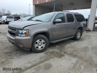 2013 Chevrolet Suburban LT with VIN 1GNSKJE72DR242862, listed as a Copart auction lot 52384365 with 163,546 mi miles and Salvage Title. Bid and sale history available at carsss.com. Image 1.
