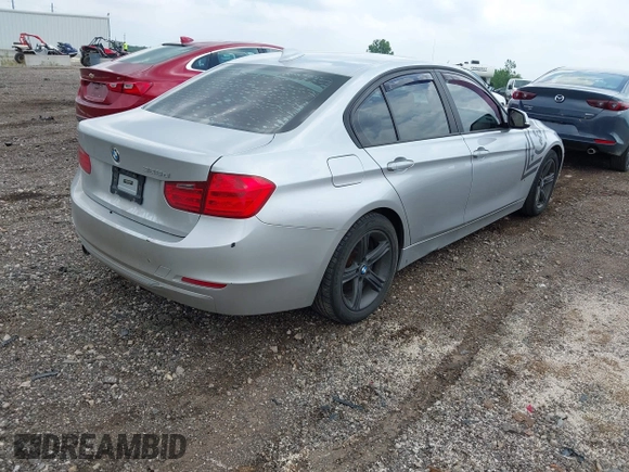 2014 BMW 3 Series 328d with VIN WBA3D3C58EK154748, listed as a IAAI auction lot 42598778 with 196,158 mi miles and . Bid and sale history available at DreamBid. Image 4.