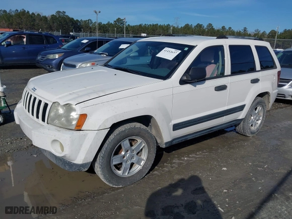 2005 Jeep Grand Cherokee Laredo with VIN 1J4GS48N75C505209, listed as a IAAI auction lot 41452637 with 263,653 mi miles. Bid and sale history available at carsss.com. Image 2.