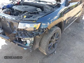 2018 Jeep Grand Cherokee Altitude with VIN 1C4RJFAG6JC147832, listed as a IAAI auction lot 42190737 with 104,280 mi miles and . Bid and sale history available at DreamBid. Image 6.