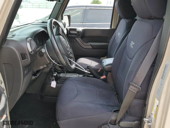2017 Jeep Wrangler Unlimited Sport with VIN 1C4BJWDG5HL670282, listed as a Copart auction lot 52332905 with 106,022 mi miles and Salvage Title. Bid and sale history available at carsss.com. Image 7.