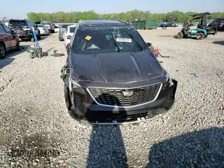2021 Cadillac XT4 FWD Premium Luxury z VIN 1GYFZCR45MF002654, wystawiony jako Copart lot #52288105 z przebiegiem Nie podano mil oraz Szkody całkowita. Historia ofert i sprzedaży dostępna na DreamBid. Obrazek 12.