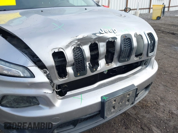 2014 Jeep Cherokee Altitude with VIN 1C4PJMCB2EW172275, listed as a IAAI auction lot 41923246 with 197,274 mi miles and . Bid and sale history available at DreamBid. Image 17.