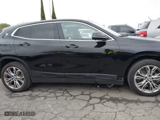 2020 BMW X2 sDrive28i with VIN WBXYH9C08L5R62746, listed as a IAAI auction lot 41788571 with 20,981 mi miles. Bid and sale history available at carsss.com. Image 13.