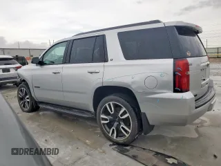 2018 Chevrolet Tahoe LT with VIN 1GNSCBKC1JR387830, listed as a Copart auction lot 60649755 with 59,649 mi miles and Salvage title. Bid and sale history available at DreamBid. Image 2.