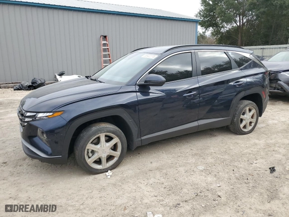 2023 Hyundai Tucson Hybrid Blue with VIN KM8JBCA15PU090204, listed as a Copart auction lot 85932274 with 28,885 mi miles and Salvage Title. Bid and sale history available at carsss.com. Image 1.