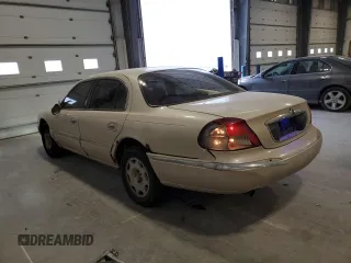 2002 Lincoln Continental with VIN 1LNHM97VX2Y694578, listed as a Copart auction lot 42245705 with 195,236 mi miles and Salvage Title. Bid and sale history available at carsss.com. Image 2.
