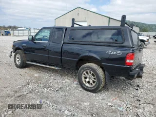 2010 Ford Ranger XLT with VIN 1FTLR4FE7APA22339, listed as a Copart auction lot 51016975 with 284,274 mi miles and Salvage Title. Bid and sale history available at DreamBid. Image 2.