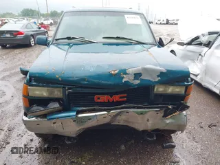 1995 GMC Suburban with VIN 1GDFK16K8SJ741041, listed as a IAAI auction lot 42315676 with 159,312 mi miles and . Bid and sale history available at DreamBid. Image 6.