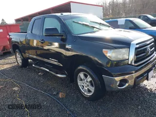 2011 Toyota Tundra 4WD Truck with VIN 5TFUW5F1XBX189747, listed as a IAAI auction lot 41636515 with 97,430 mi miles. Bid and sale history available at carsss.com. Image 1.
