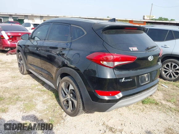 2018 Hyundai Tucson Sport z VIN KM8J33AL5JU741563, wystawiony jako IAAI lot #41928357 z przebiegiem 97 004 mil mil oraz . Historia ofert i sprzedaży dostępna na DreamBid. Obrazek 3.
