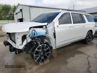 2024 Chevrolet Suburban RST with VIN 1GNSKEKD9RR356205, listed as a Copart auction lot 56562055 with 7,283 mi miles and Salvage title. Bid and sale history available at DreamBid. Image 1.