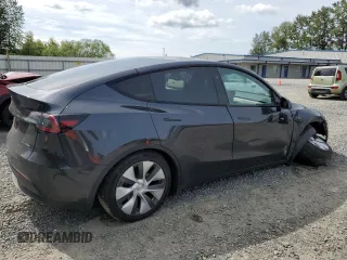 2024 Tesla Model Y Long Range z VIN 7SAYGDEE8RF986258, wystawiony jako Copart lot #58434275 z przebiegiem 59 934 mil mil oraz Szkoda całkowita • Salvage title. Historia ofert i sprzedaży dostępna na DreamBid. Obrazek 3.