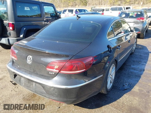 2013 Volkswagen CC Sport with VIN WVWBP7AN9DE565587, listed as a IAAI auction lot 41739505 with 167,319 mi miles. Bid and sale history available at carsss.com. Image 4.