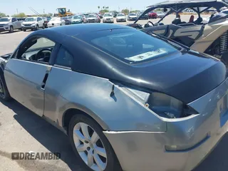 2004 Nissan 350Z Enthusiast z VIN JN1AZ34D74T164233, wystawiony jako IAAI lot #42509421 z przebiegiem 90 780 mil mil oraz . Historia ofert i sprzedaży dostępna na DreamBid. Obrazek 18.