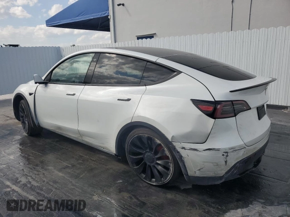 2023 Tesla Model Y Performance with VIN 7SAYGDEF8PF595178, listed as a Copart auction lot 46496995 with 39,057 mi miles and Non Repairable. Bid and sale history available at DreamBid. Image 2.