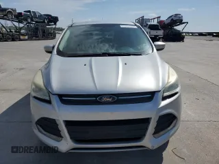 2013 Ford Escape SE с VIN 1FMCU0G9XDUA41798, выставлен на аукционе Copart как лот 57460025 с пробегом 137 816 миль миль и Списание • Salvage title. История ставок и продаж доступна на DreamBid. Изображение 5.