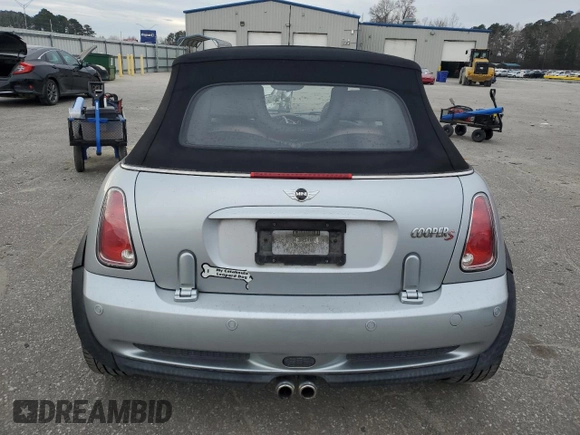 2005 MINI Convertible S with VIN WMWRH33575TK56034, listed as a Copart auction lot 88043565 with 33,410 mi miles and Salvage title. Bid and sale history available at DreamBid. Image 6.