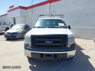2014 Ford F-150 XL with VIN 1FTMF1CM4EKG22844, listed as a IAAI auction lot 41669259 with 242,141 mi miles. Bid and sale history available at carsss.com. Image 11.