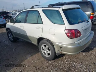 1999 Lexus RX 300 z VIN JT6HF10U2X0090375, wystawiony jako IAAI lot #41874552 z przebiegiem 179 885 mil mil oraz . Historia ofert i sprzedaży dostępna na DreamBid. Obrazek 3.