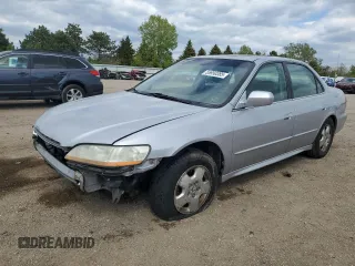2002 Honda Accord EX z VIN 1HGCG16592A065042, wystawiony jako Copart lot #55950385 z przebiegiem 156 718 mil mil oraz Szkoda całkowita • Salvage title. Historia ofert i sprzedaży dostępna na DreamBid. Obrazek 1.