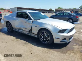 2013 Ford Mustang V6 with VIN 1ZVBP8AM4D5212653, listed as a IAAI auction lot 42090402 with 134,437 mi miles. Bid and sale history available at carsss.com. Image 1.