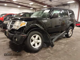 2007 Dodge Nitro SXT with VIN 1D8GU28K67W663621, listed as a IAAI auction lot 41691529 with 211,556 mi miles. Bid and sale history available at carsss.com. Image 2.