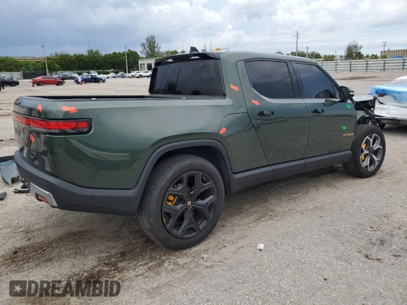 2023 Rivian R1T Adventure z VIN 7FCTGAAA8PN001040, wystawiony jako Copart lot #71517874 z przebiegiem 19 789 mil mil oraz Szkoda całkowita • Salvage title. Historia ofert i sprzedaży dostępna na DreamBid. Obrazek 3.