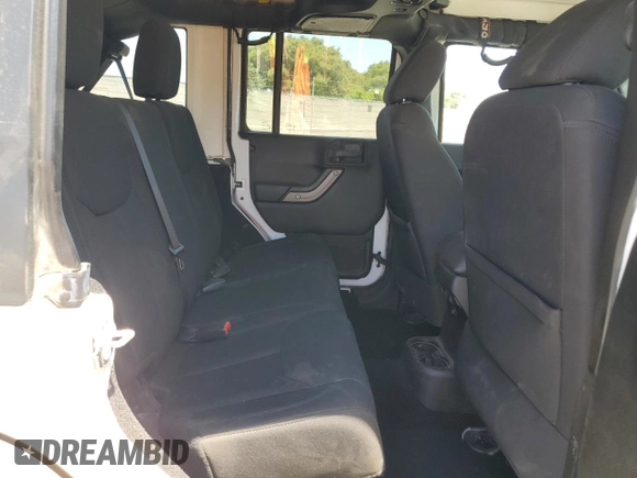 2016 Jeep Wrangler Unlimited Sport with VIN 1C4BJWDG0GL309976, listed as a Copart auction lot 63340505 with 66,714 mi miles and Salvage title. Bid and sale history available at DreamBid. Image 11.
